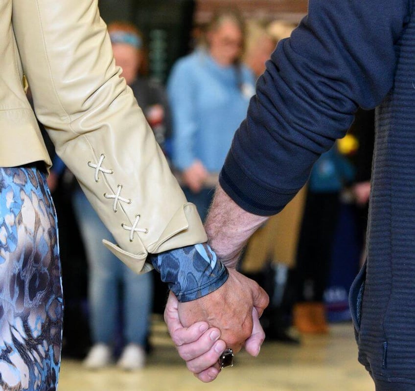 hands around the courthouse and county event raises awareness of child abuse