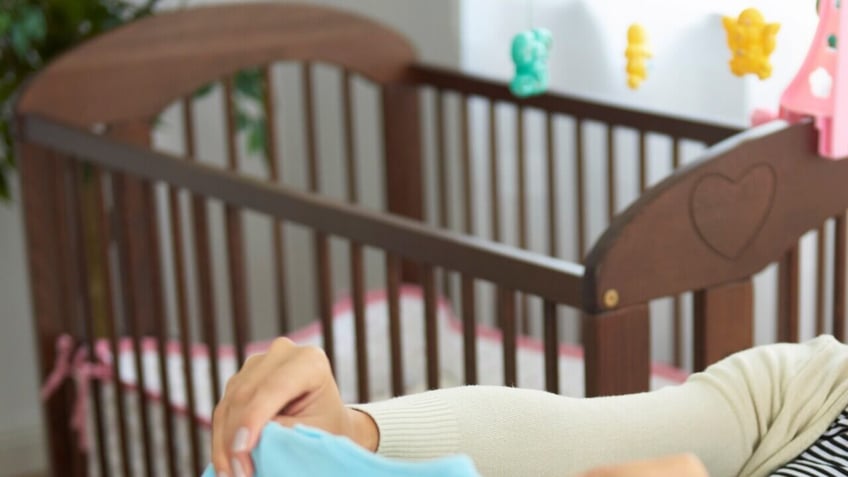 mother and boyfriend arrested for child neglect abuse following death of 11 month old