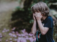professor researches the effects of child abuse