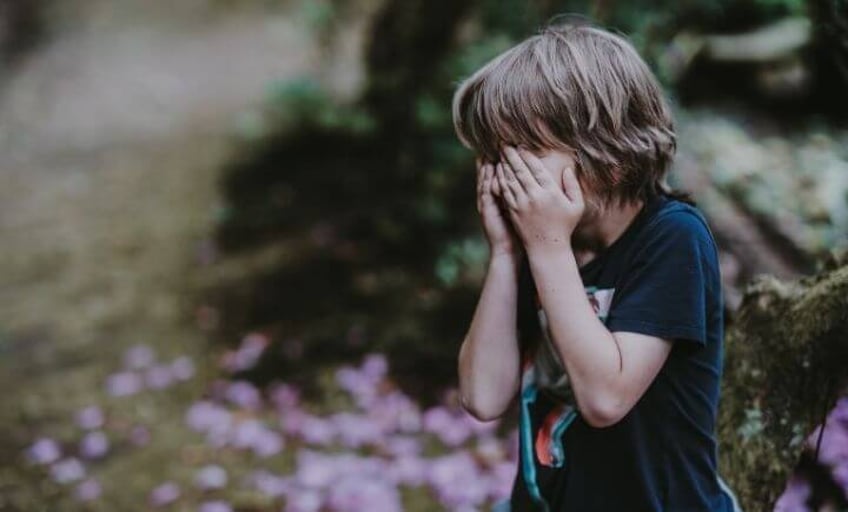 professor researches the effects of child abuse