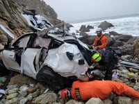 wife of man accused of intentionally driving his family off a cliff has asked officials not to prosecute him