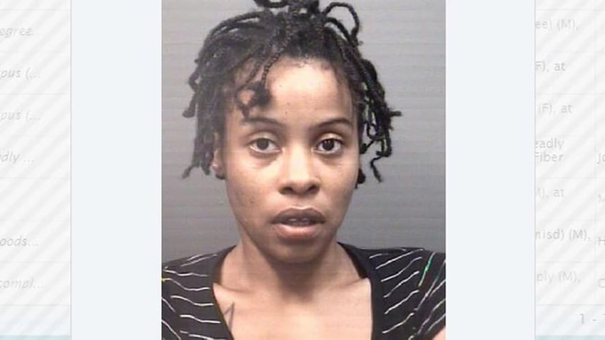 woman charged with assault and child abuse after allegedly jumping out of moving car while holding child