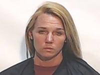 woman charged with child abuse accused of beating child with belt and paddle