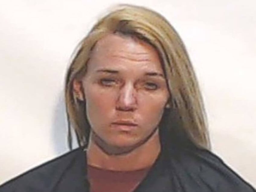 woman charged with child abuse accused of beating child with belt and paddle
