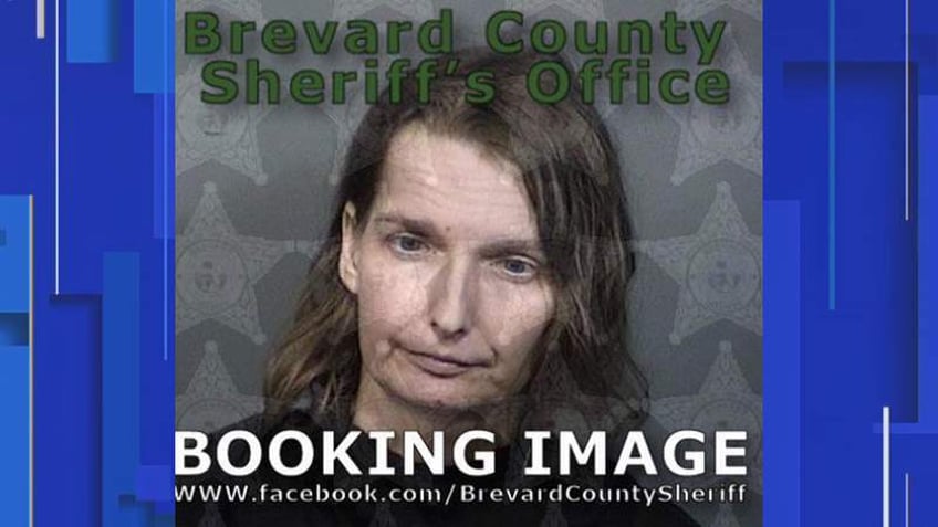 woman kept severely autistic child locked inside of wood and metal cage palm bay police say